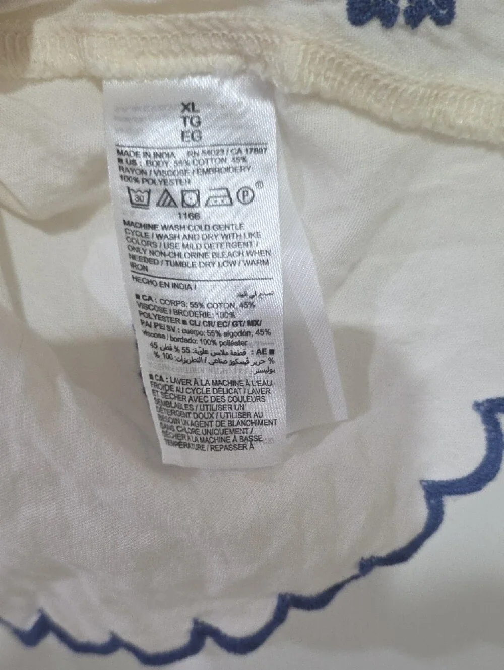 Old Navy Cream Peasant Blouse with Blue Floral Embroidery